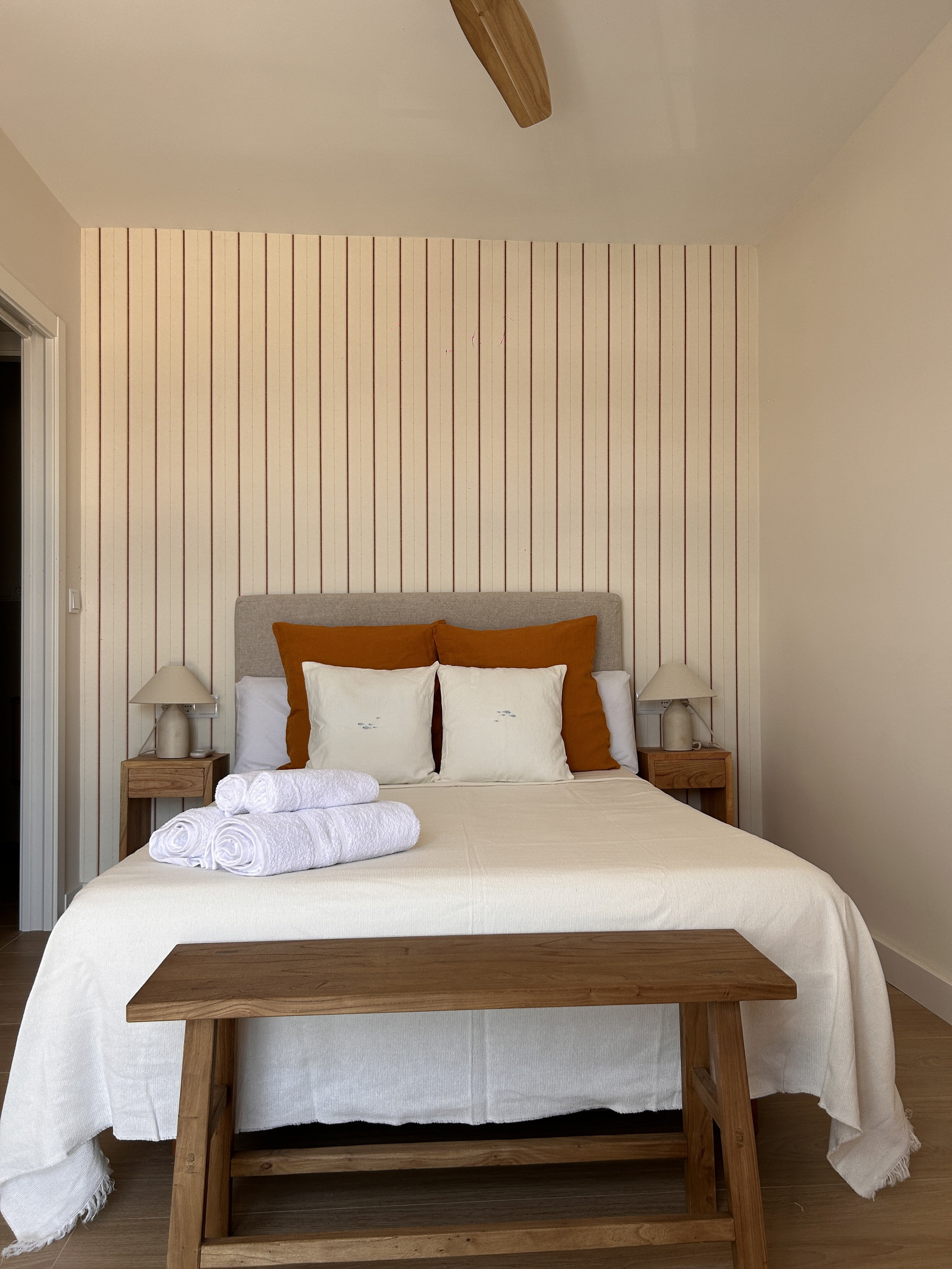 Bedroom bed with orange accents
