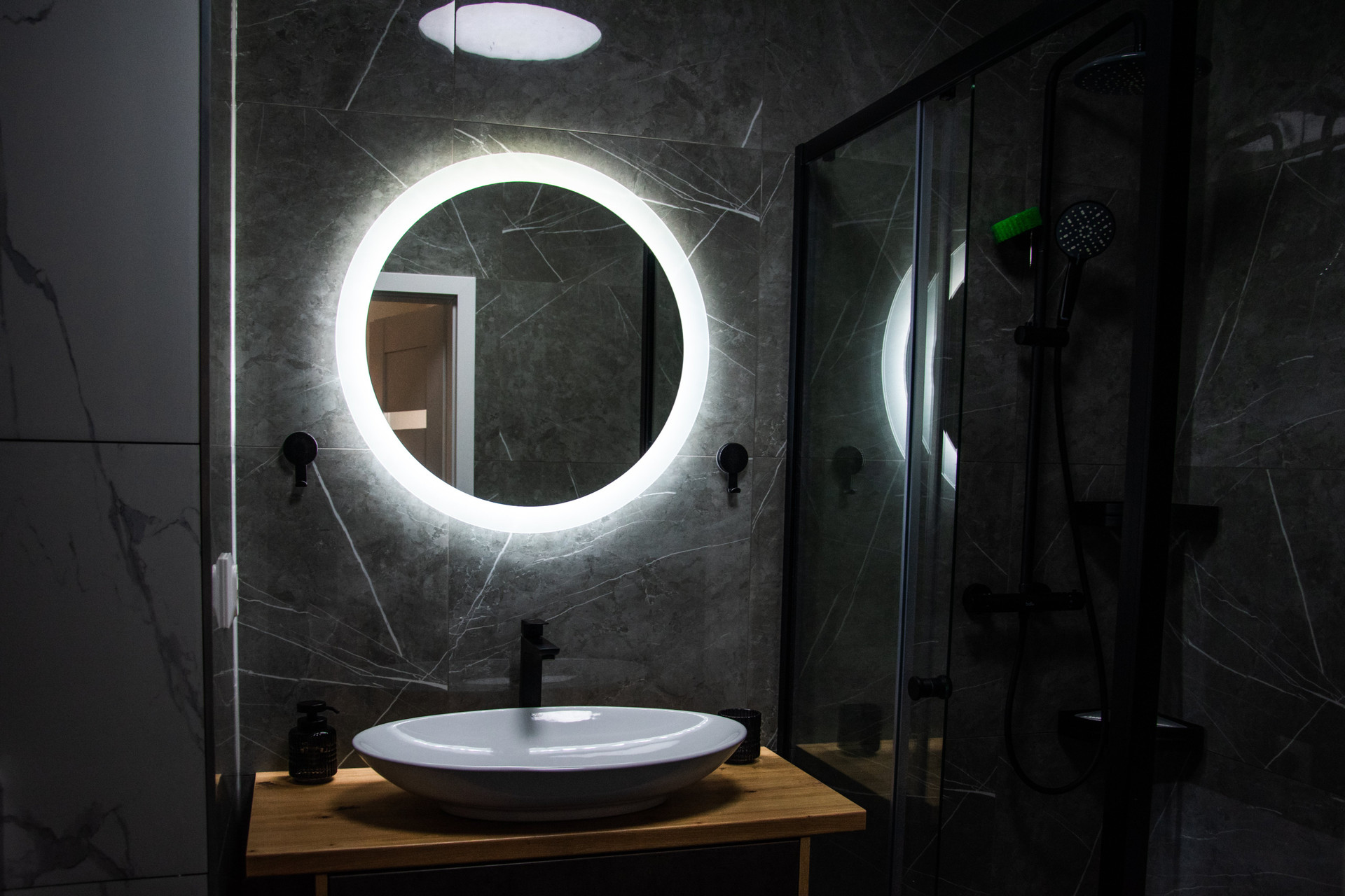 Bathroom vanity with round mirror