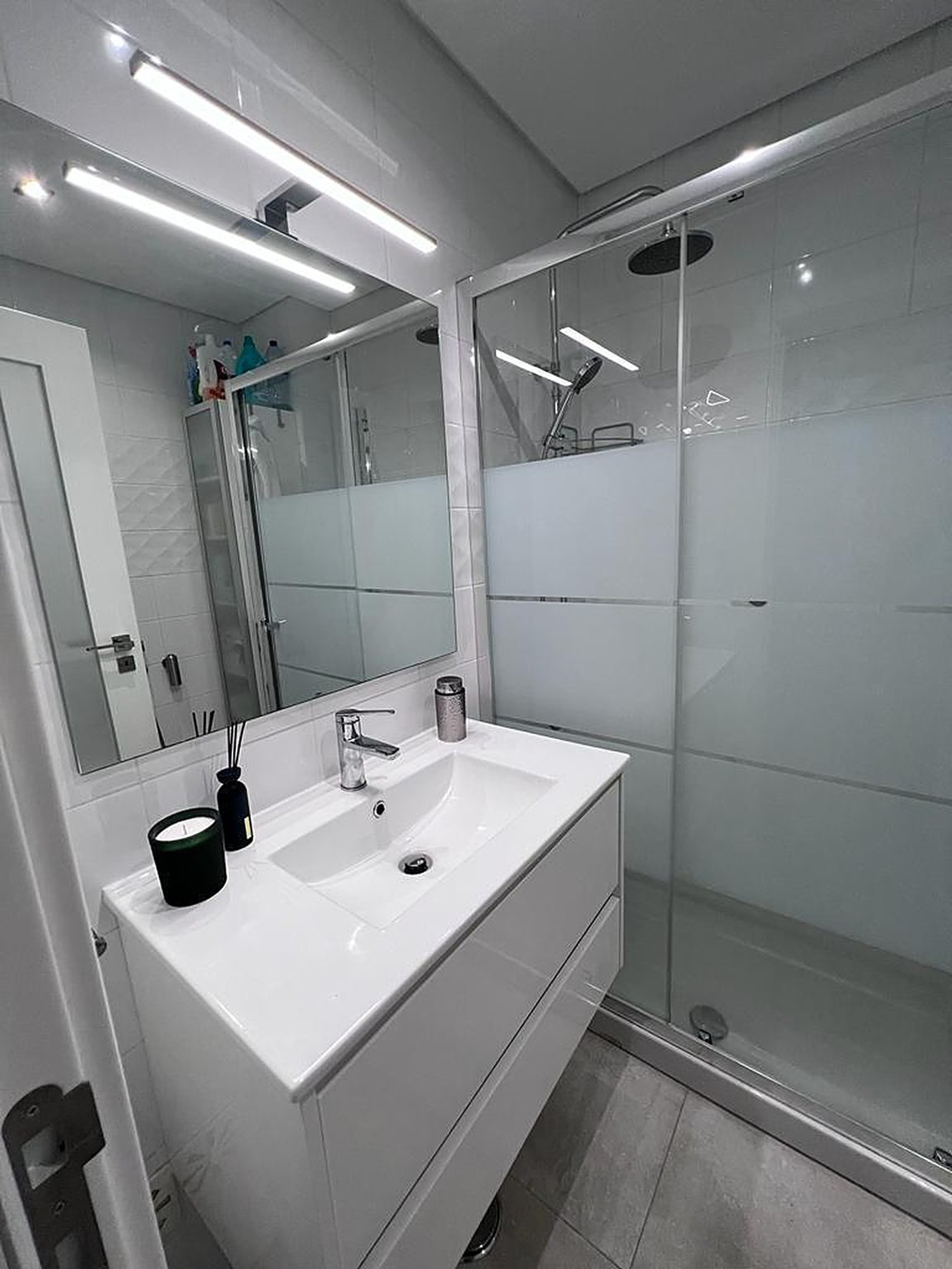 Bathroom with vanity and shower