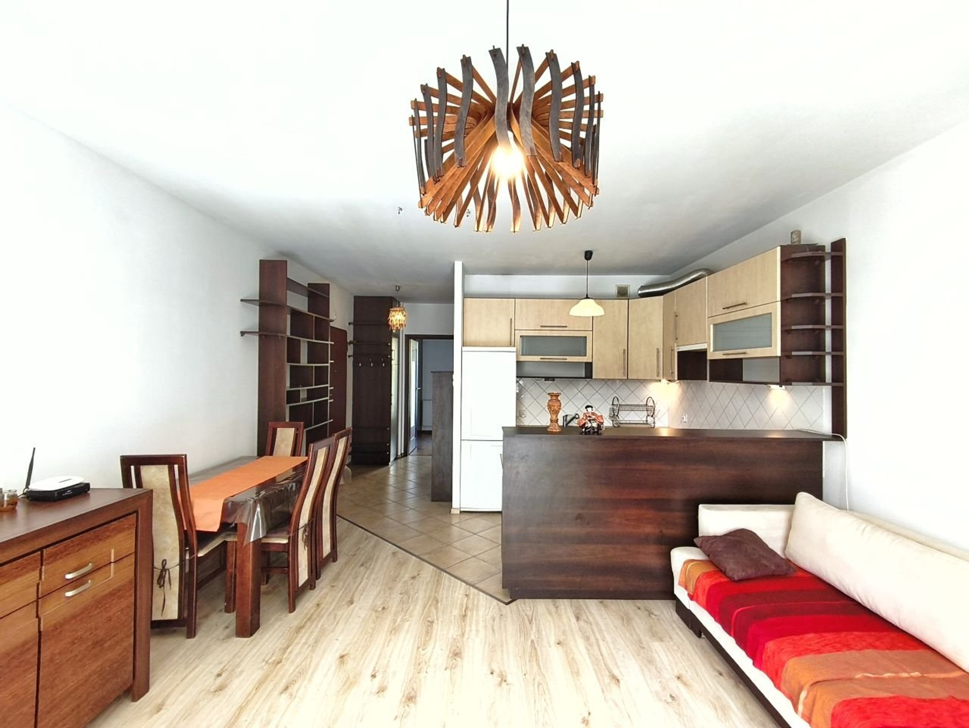 Open living room with kitchen and dining