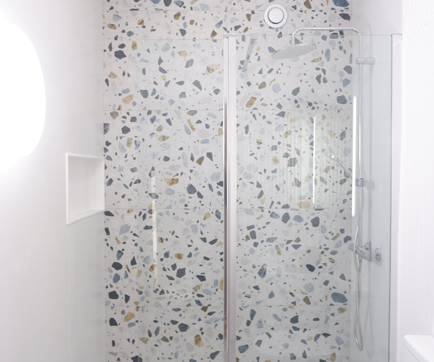 Terrazzo shower with glass screen