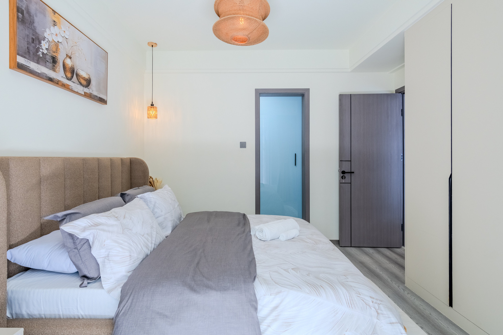 Bedroom with bed and wardrobe