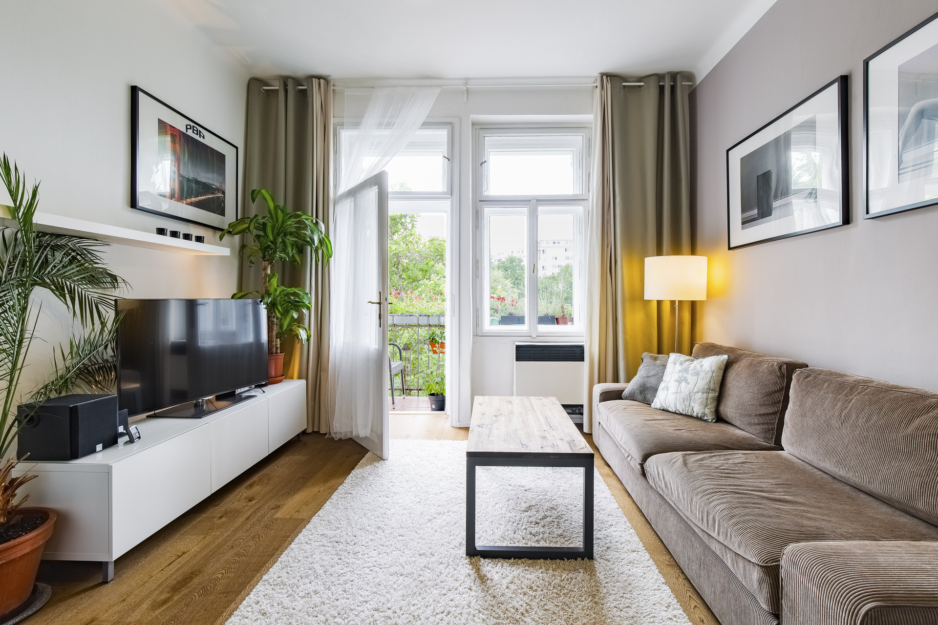 Bright living room with balcony access
