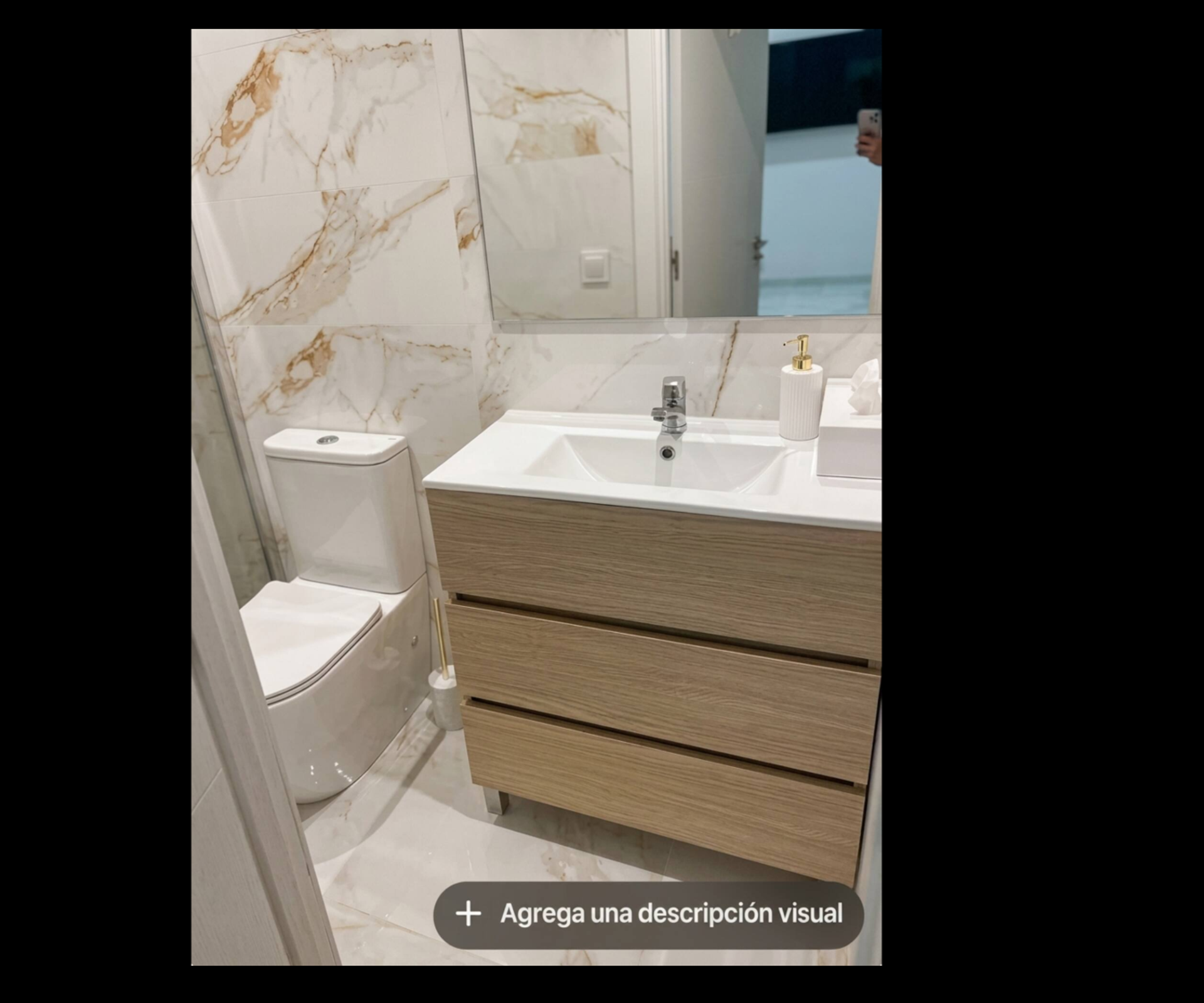 Bathroom vanity with marble tiles