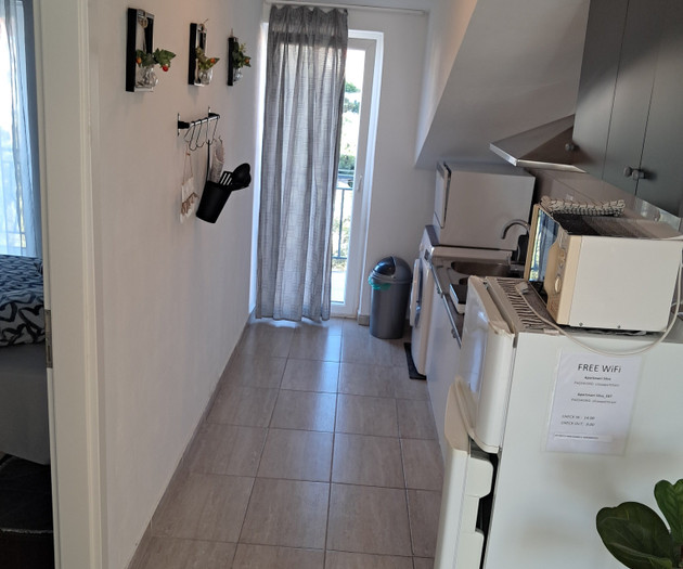 Kitchen hallway with appliances
