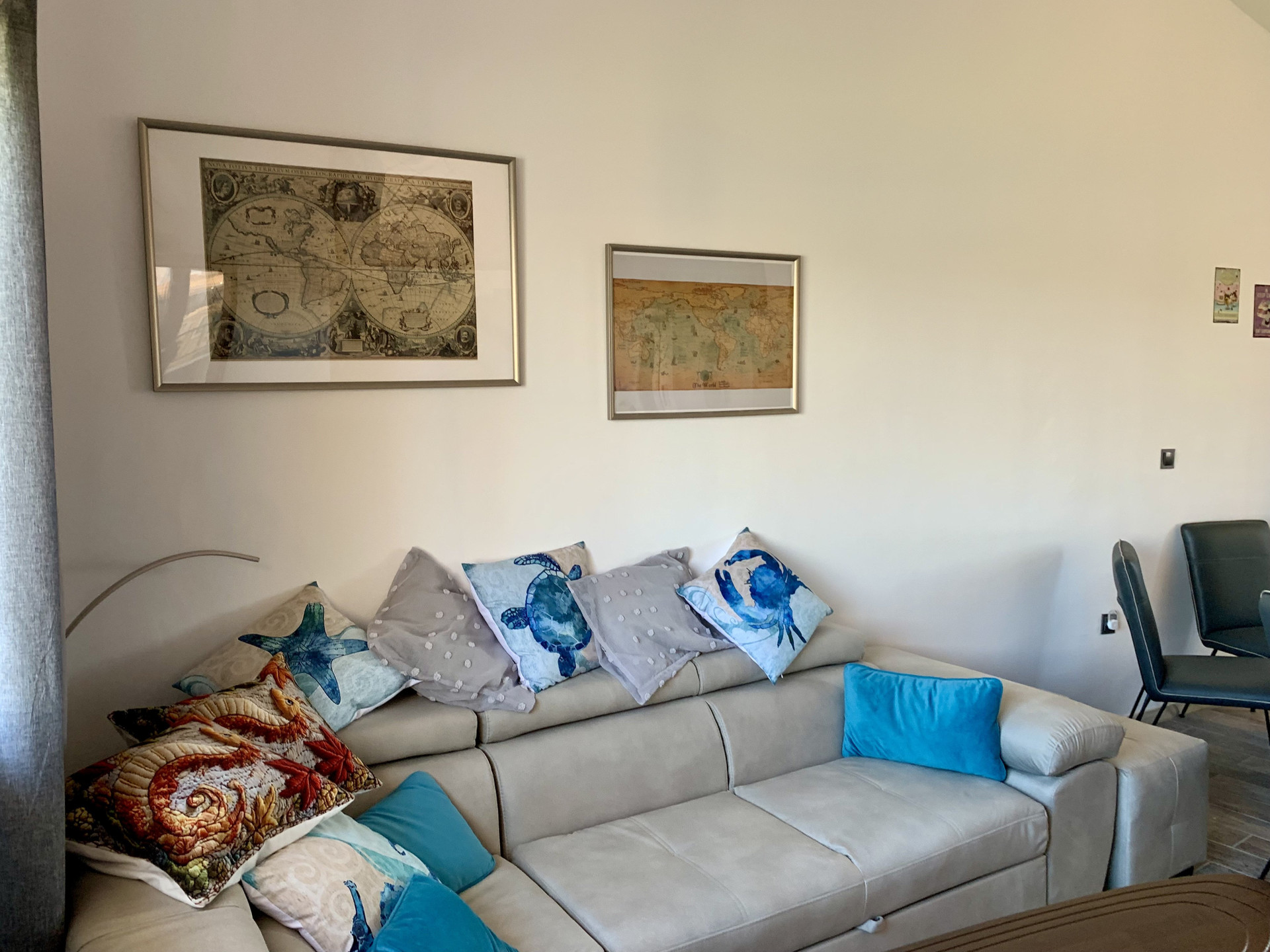 Living room sofa with map art