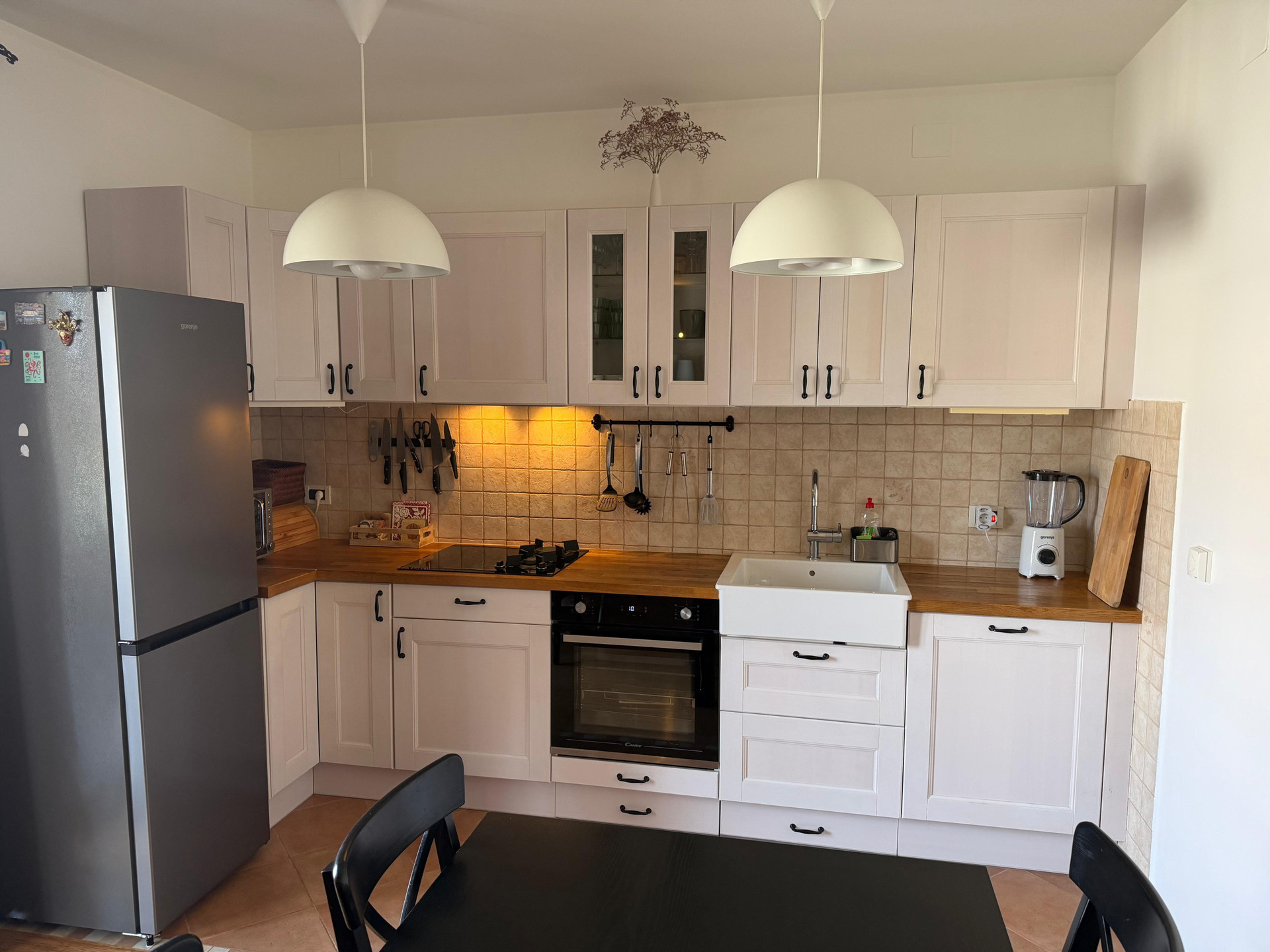 Kitchen with wooden countertops and appliances