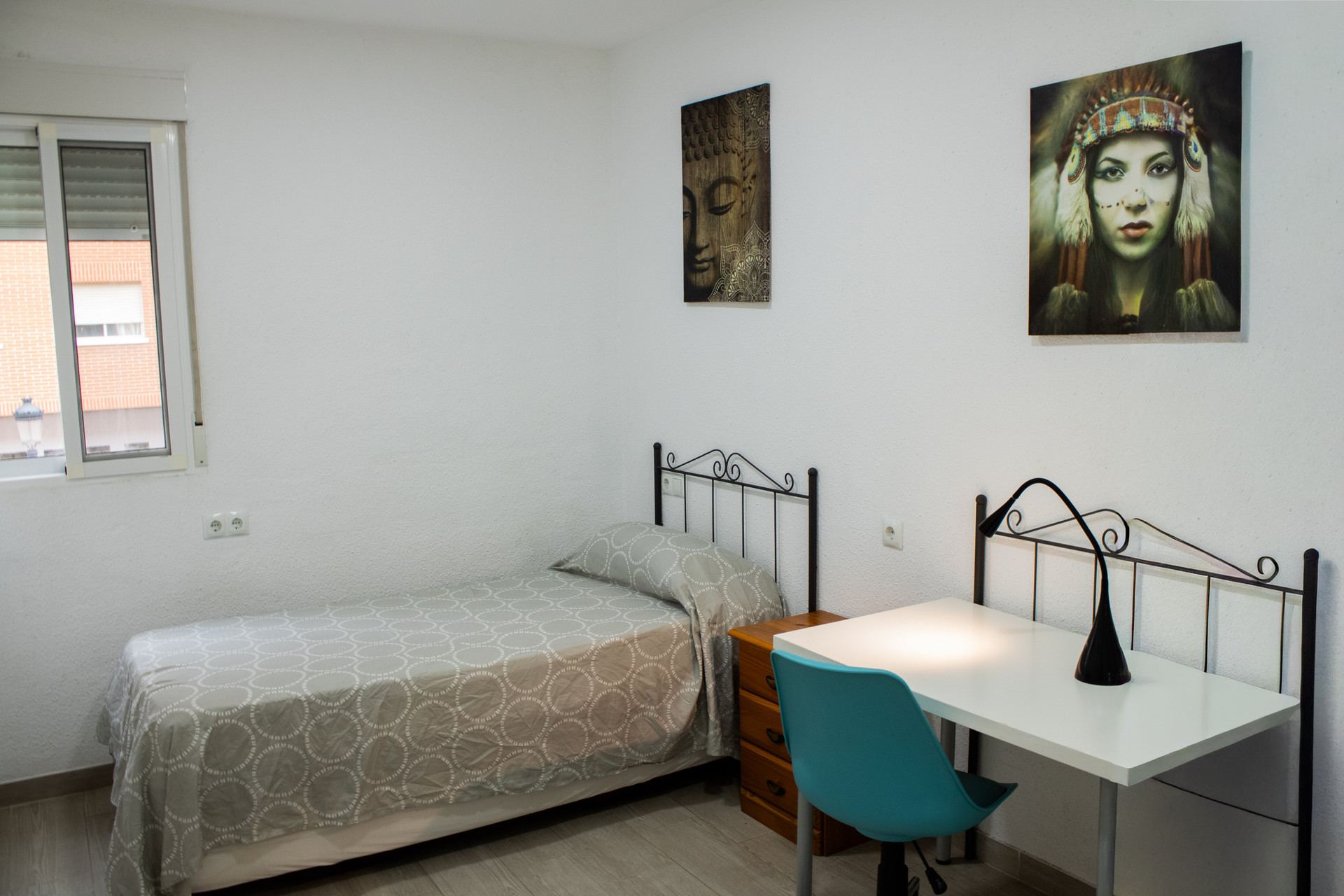 Bedroom with single bed and desk