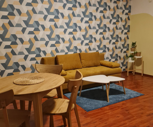 Living and dining area, geometric wall