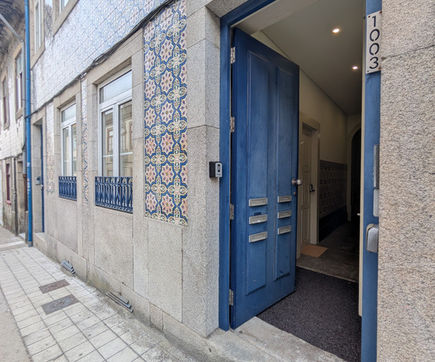 Building entrance with blue door