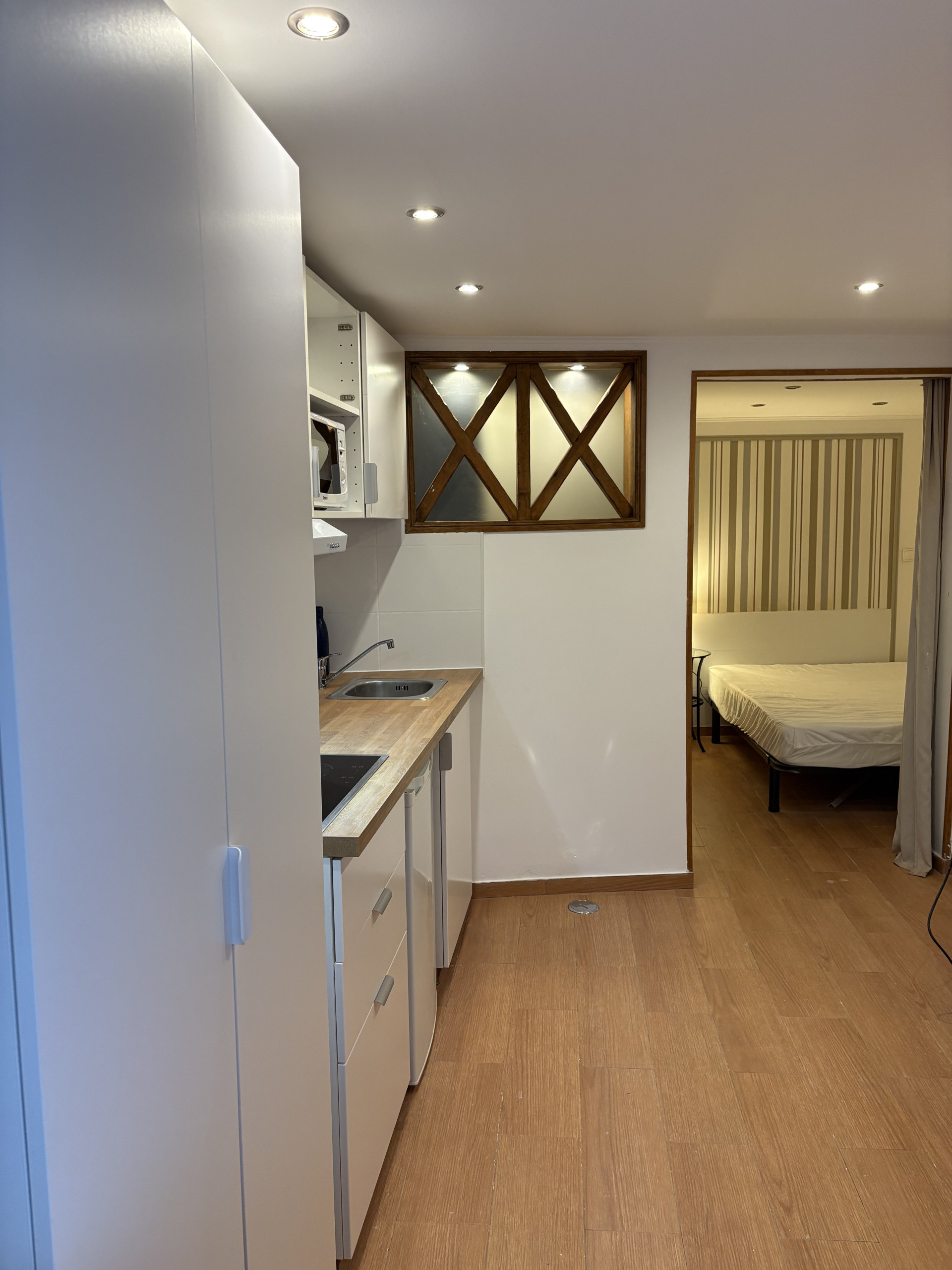 Open kitchen and bedroom view