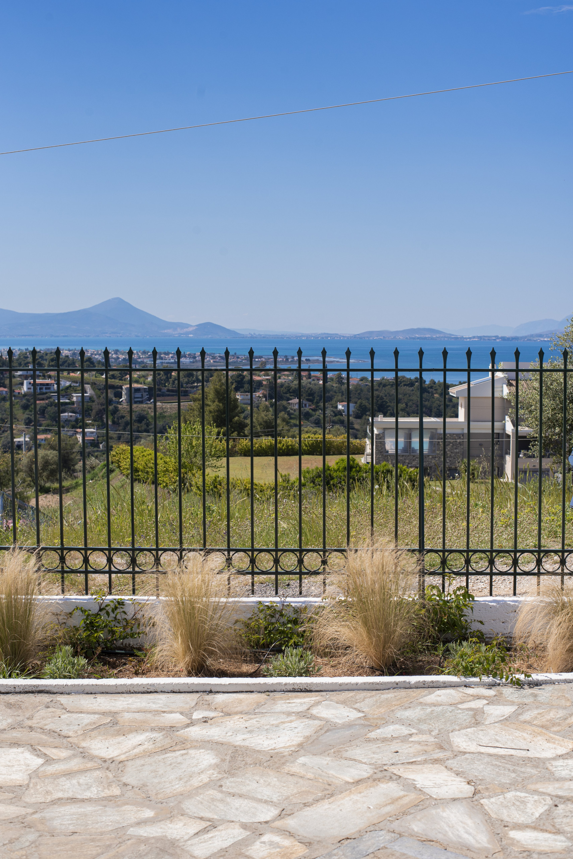 Sea view through fence