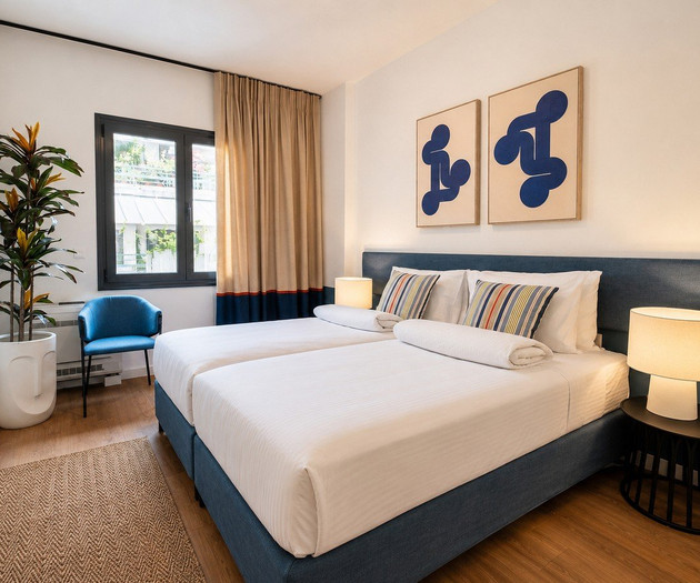 Twin bedroom with blue accents