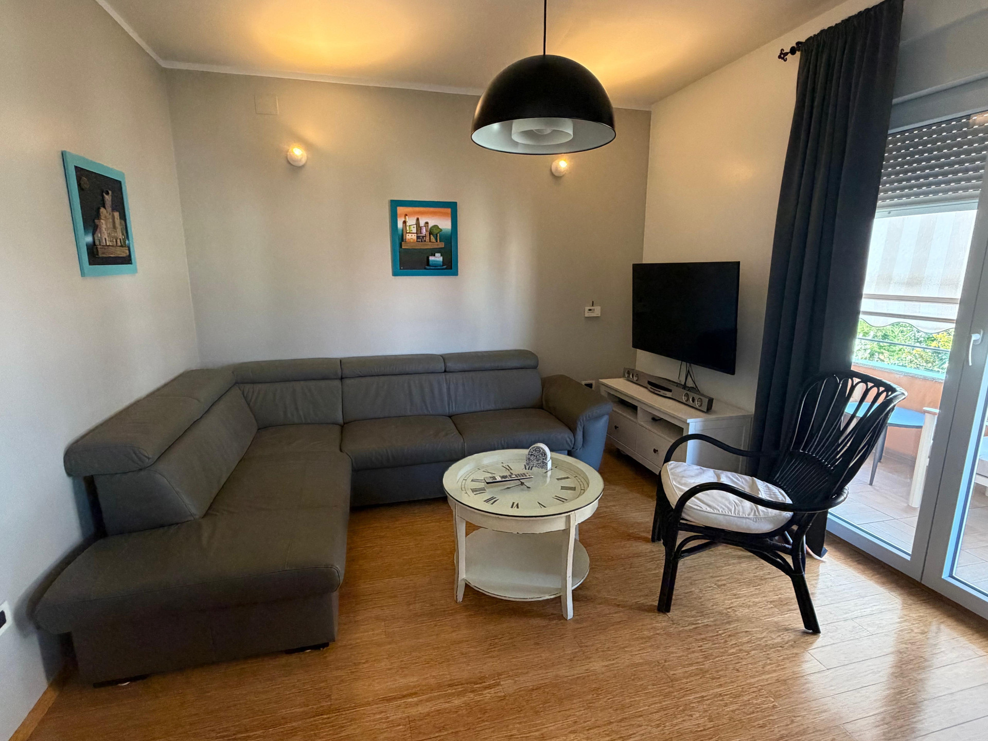 Living room with sectional sofa and TV