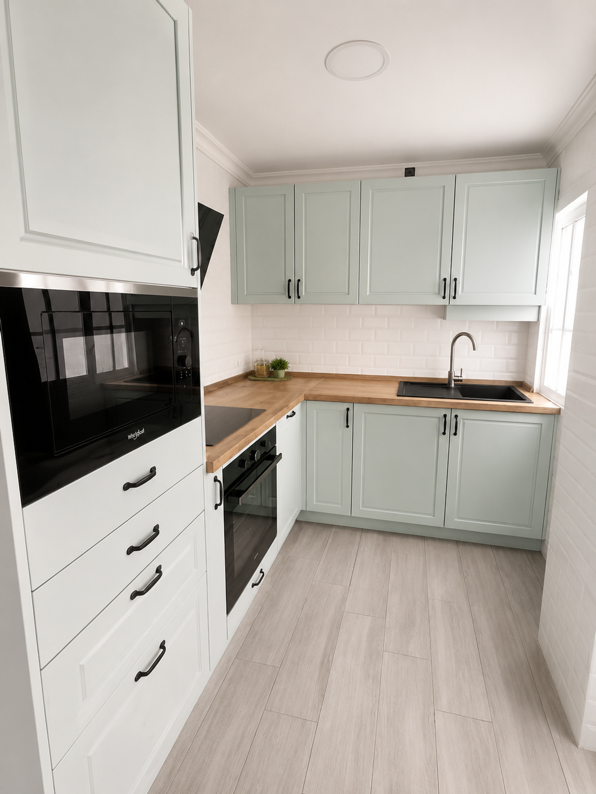 Modern kitchen with sage cabinets