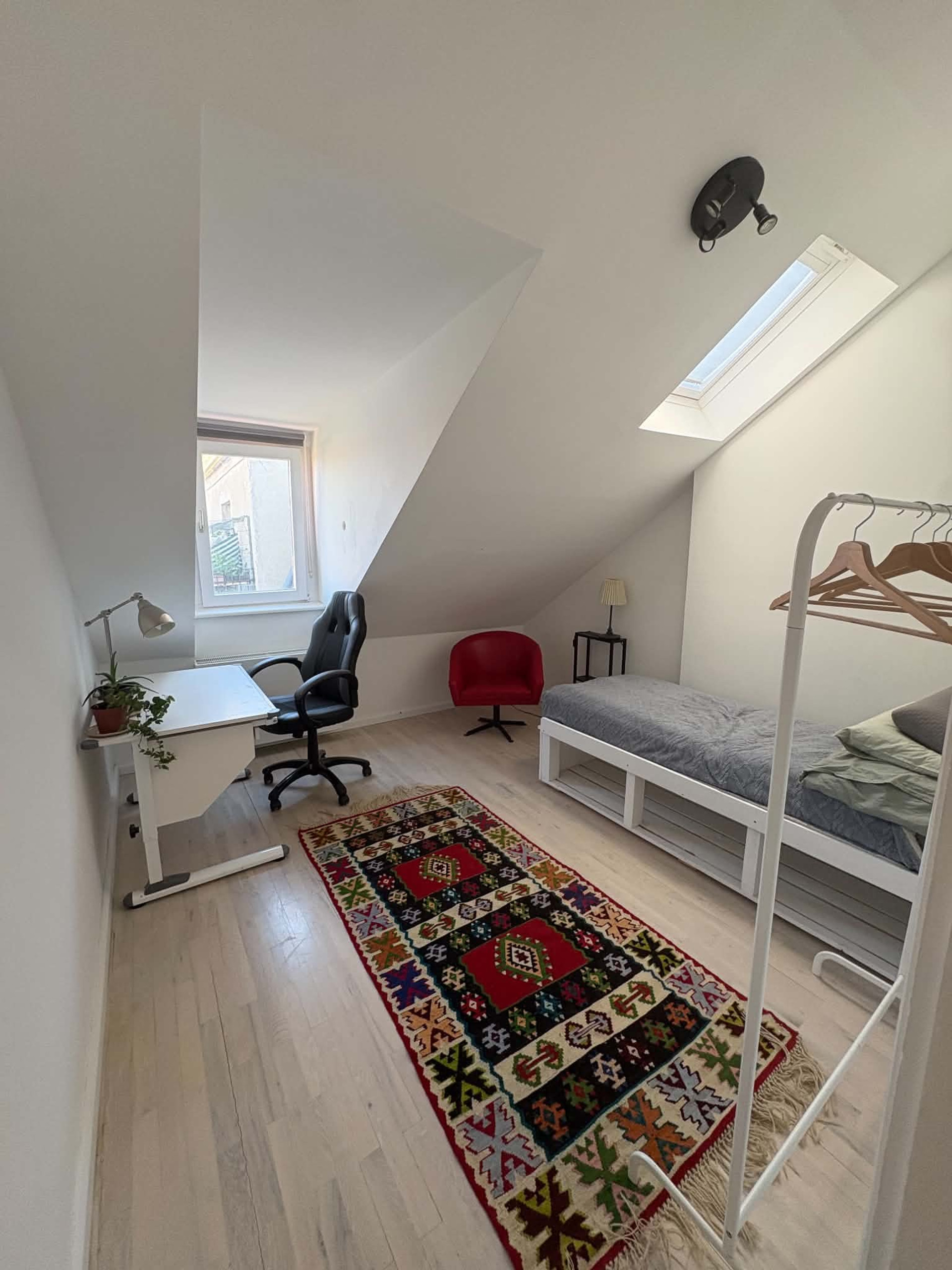 Bedroom with desk and single bed