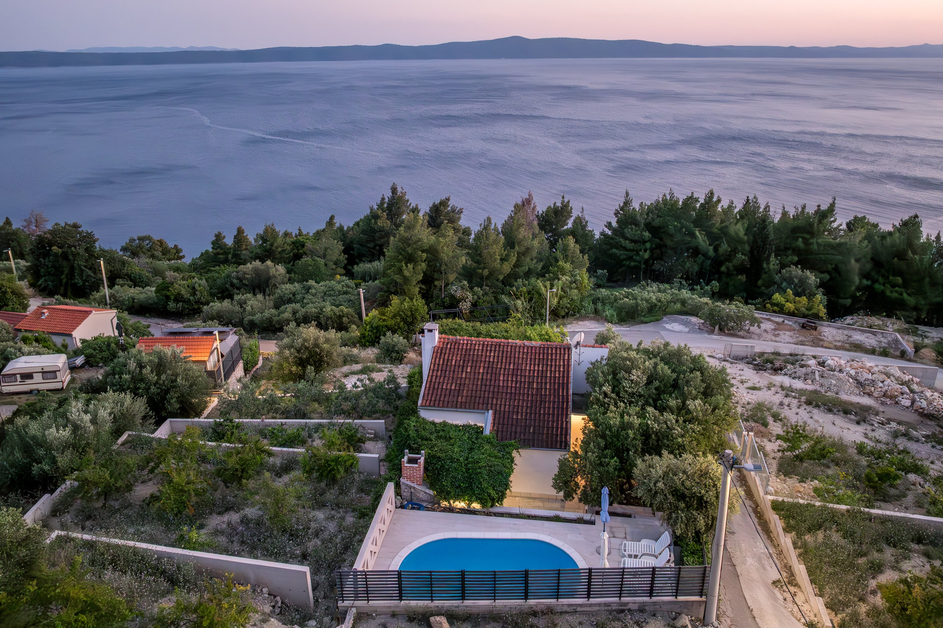 House viewed from above, showing the property layout and its surroundings.