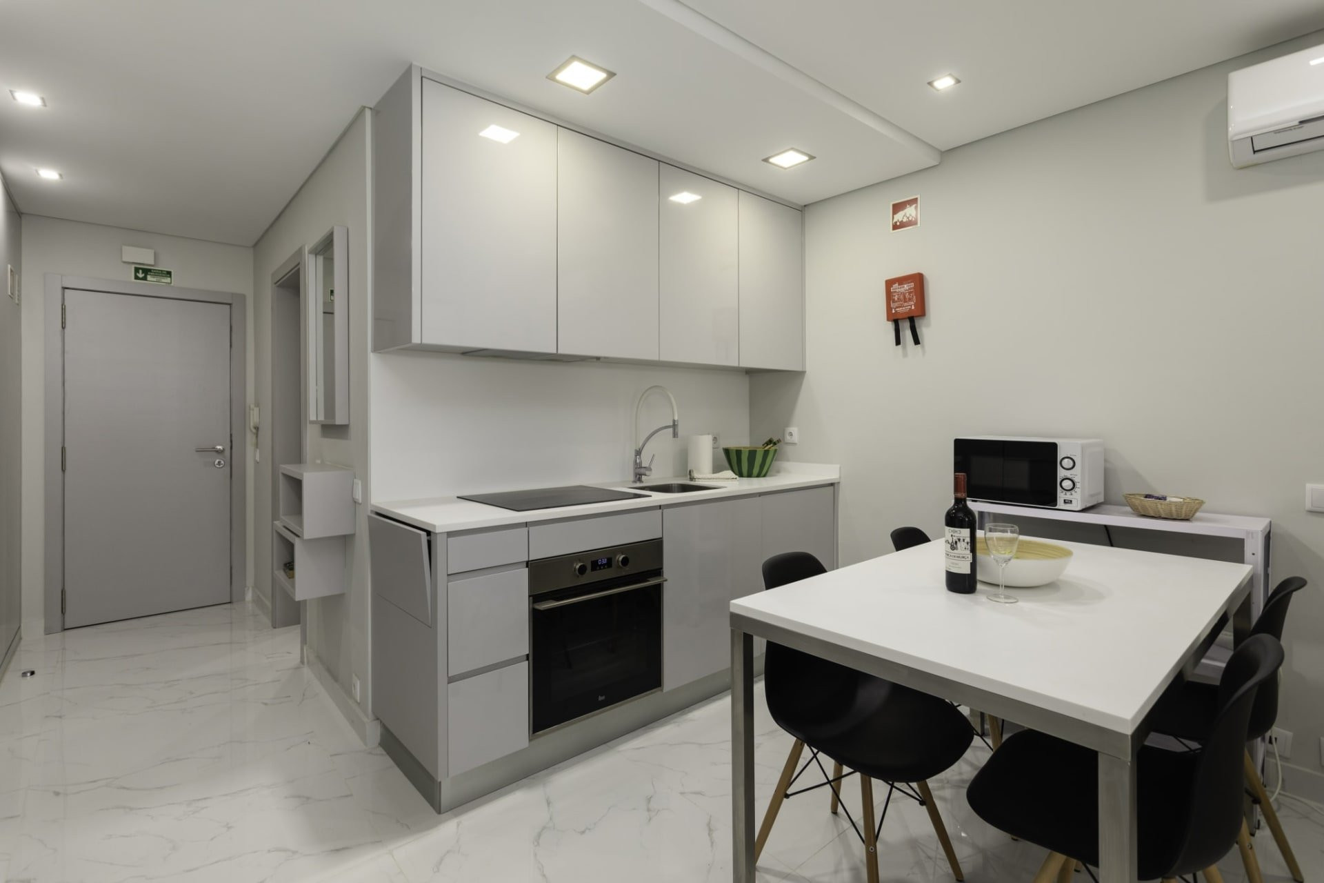 Compact modern kitchen with dining table