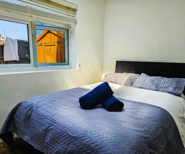 Double bedroom with blue bedding