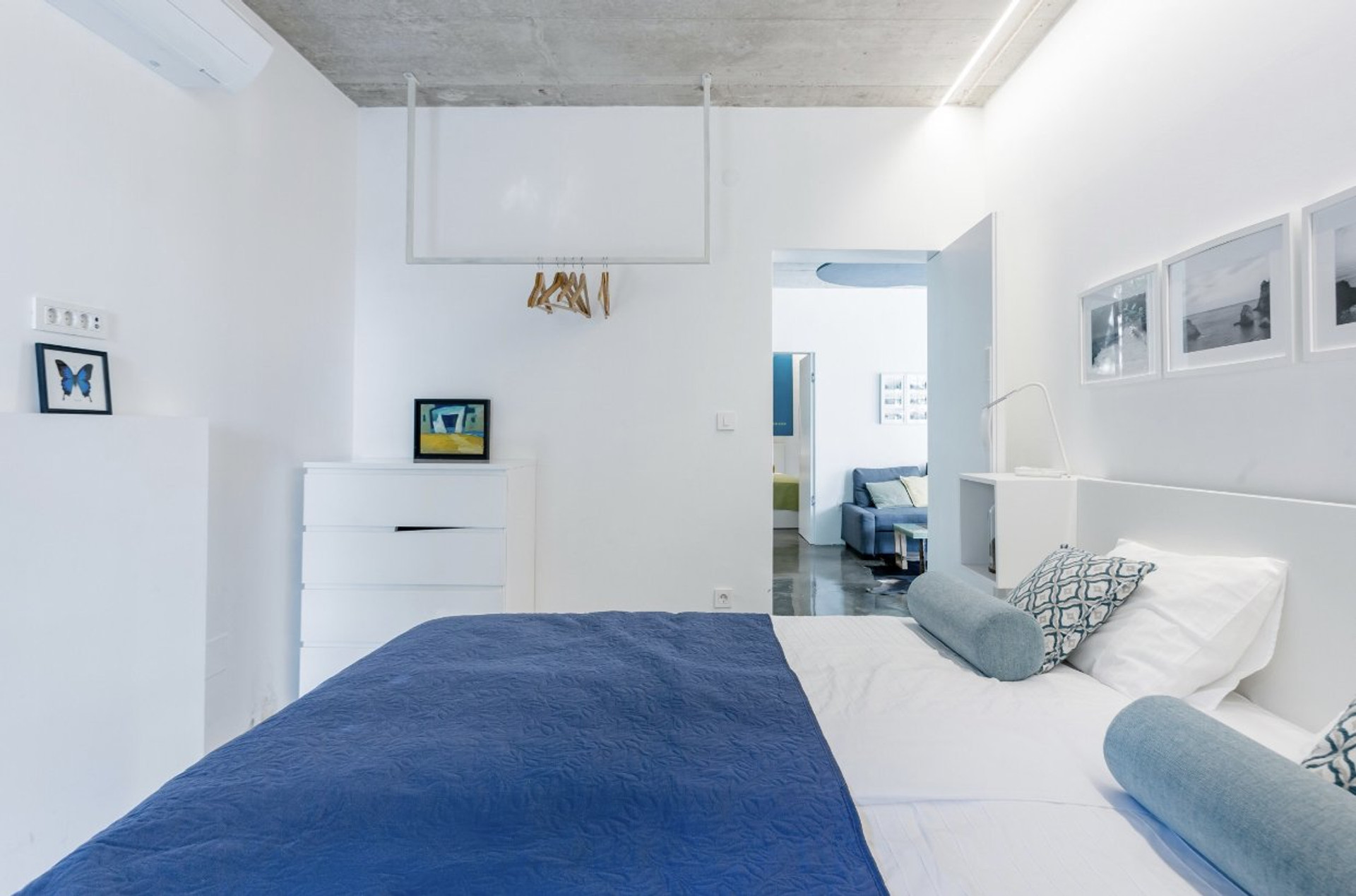 Bedroom with blue bedding