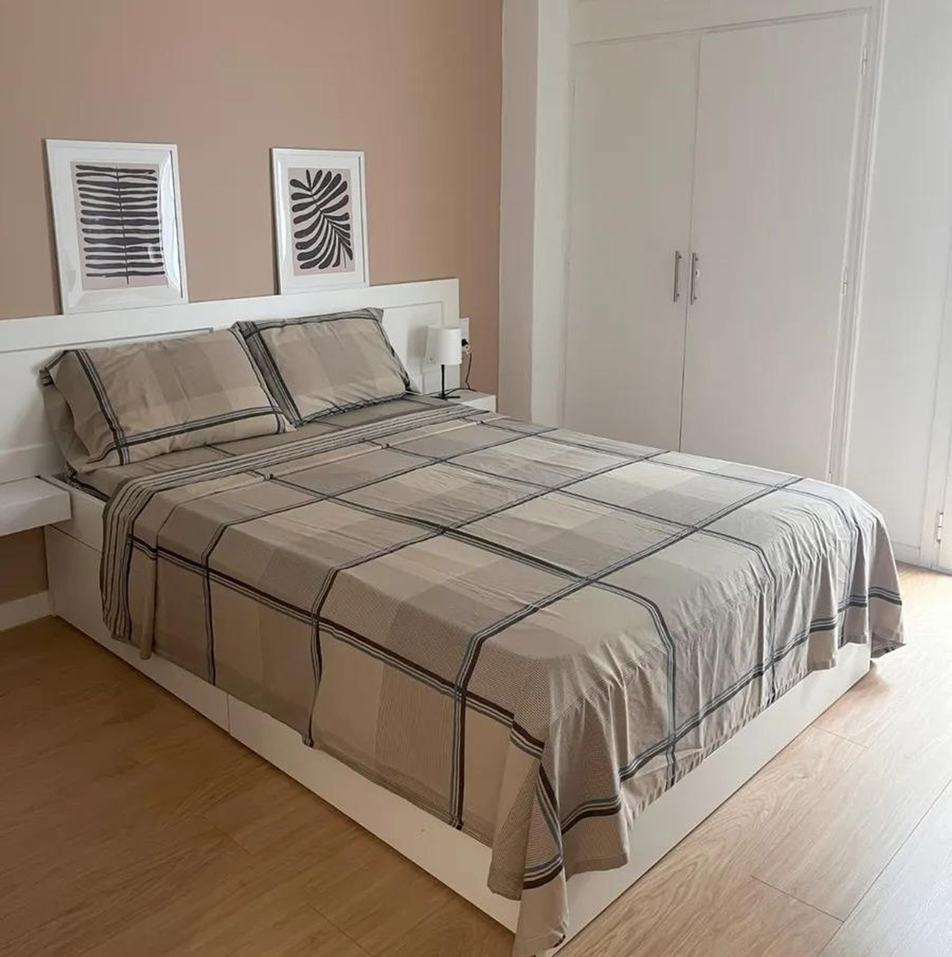 Double bed with artwork