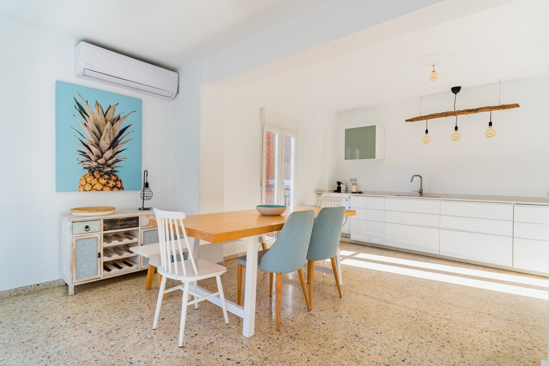 Kitchen and dining room. Air conditioning hot/cold, in this living room and kitchen room