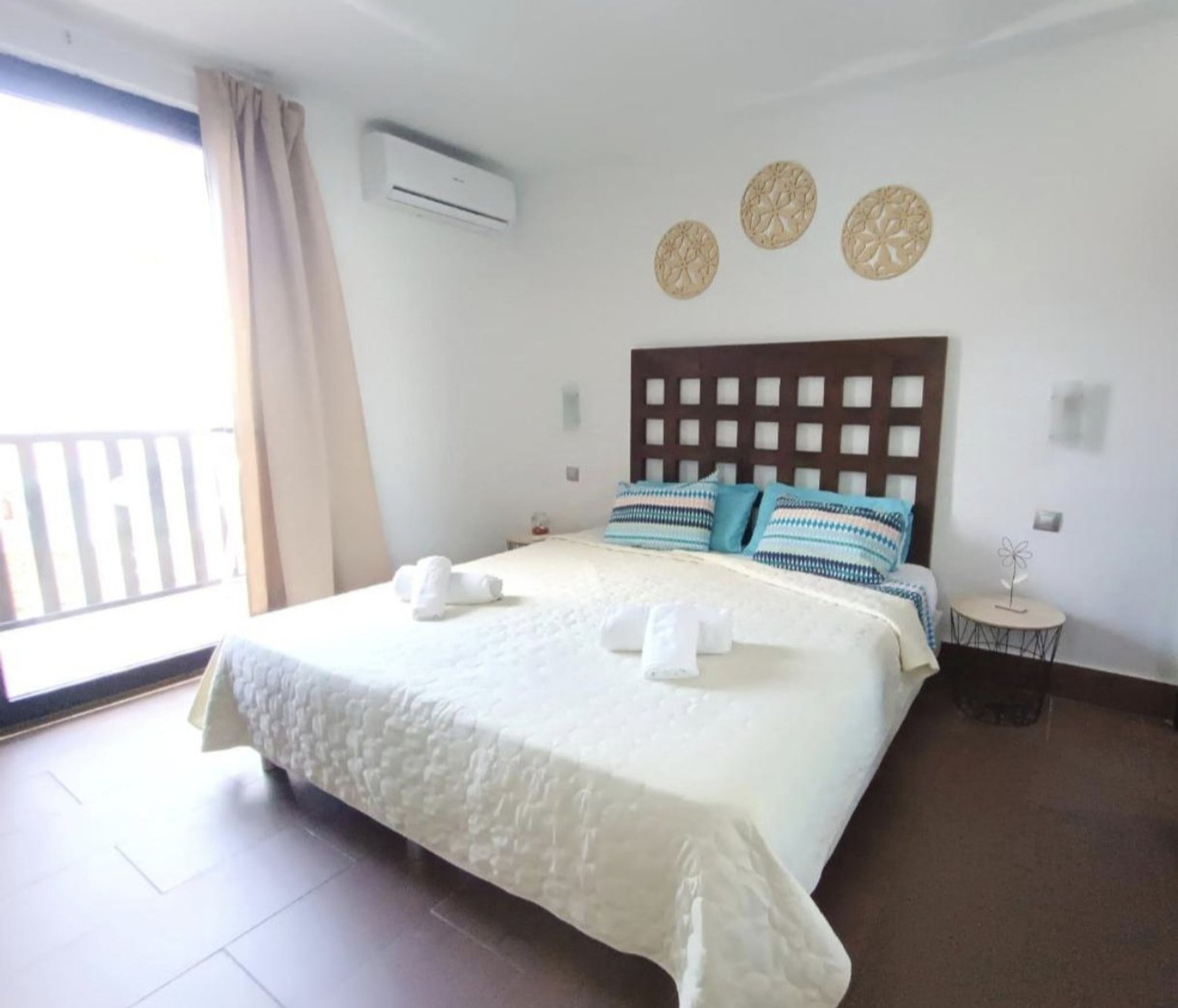 Bright double bedroom with balcony
