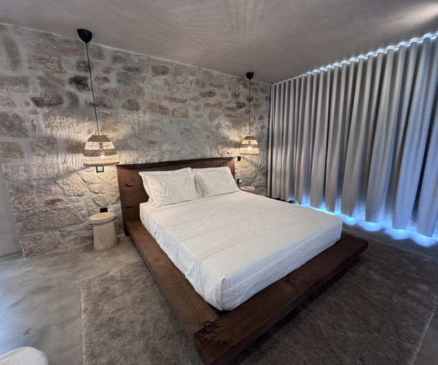 Bedroom with curtains and lighting