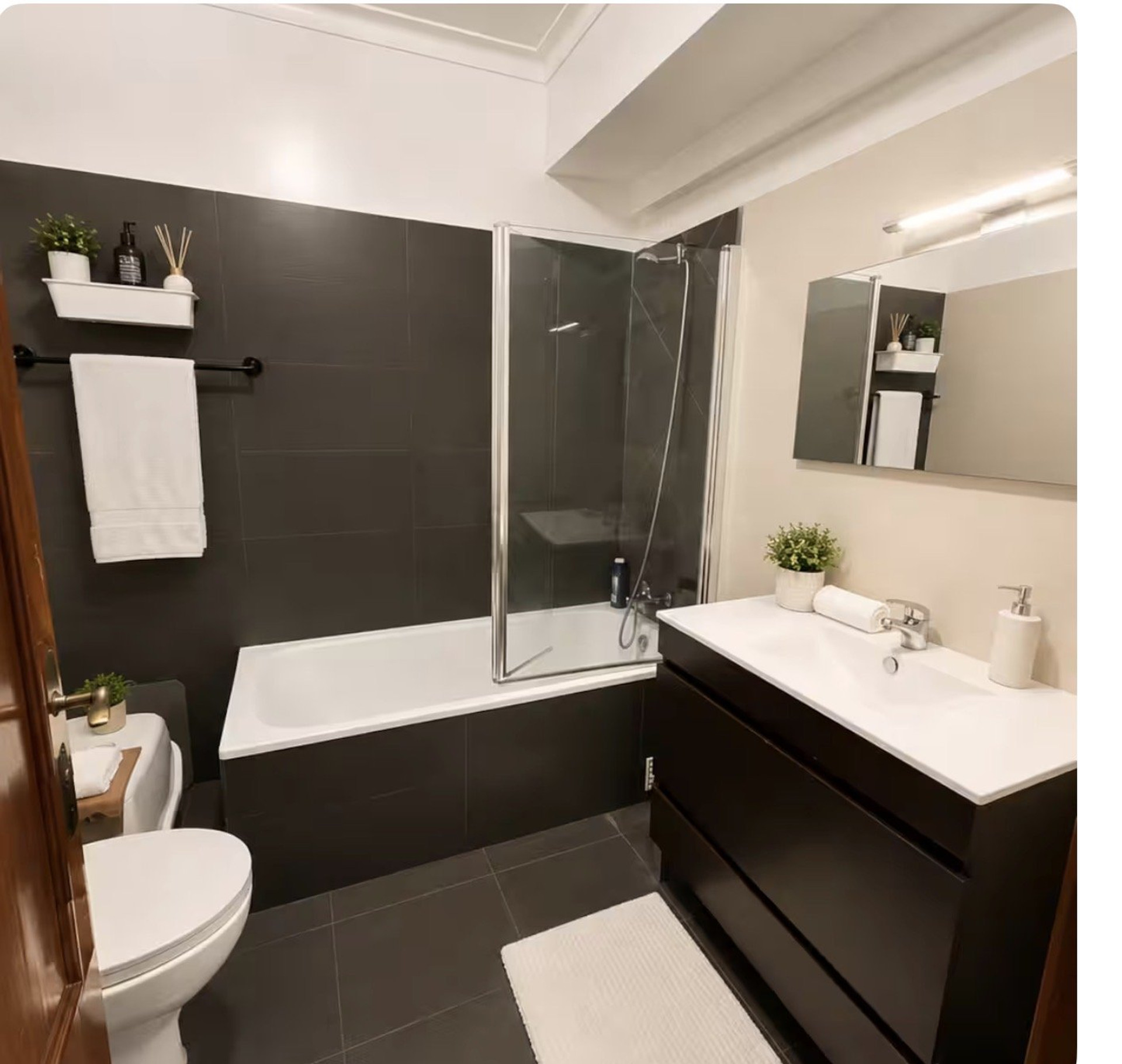Bathroom with bathtub shower