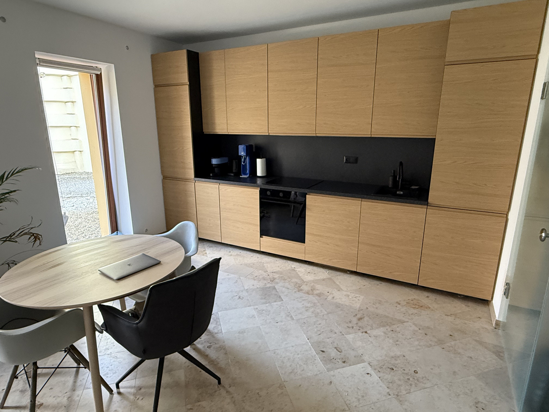 Modern kitchen with dining area