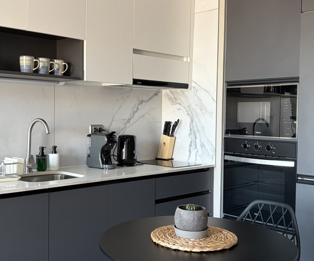 Modern kitchen with dark cabinets