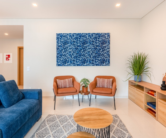 Living room with blue art
