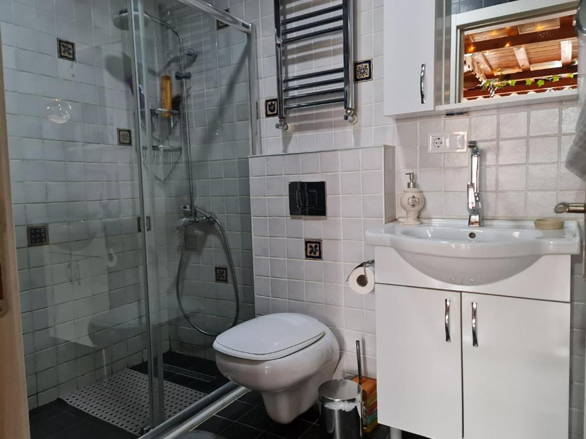 Bathroom with shower and sink