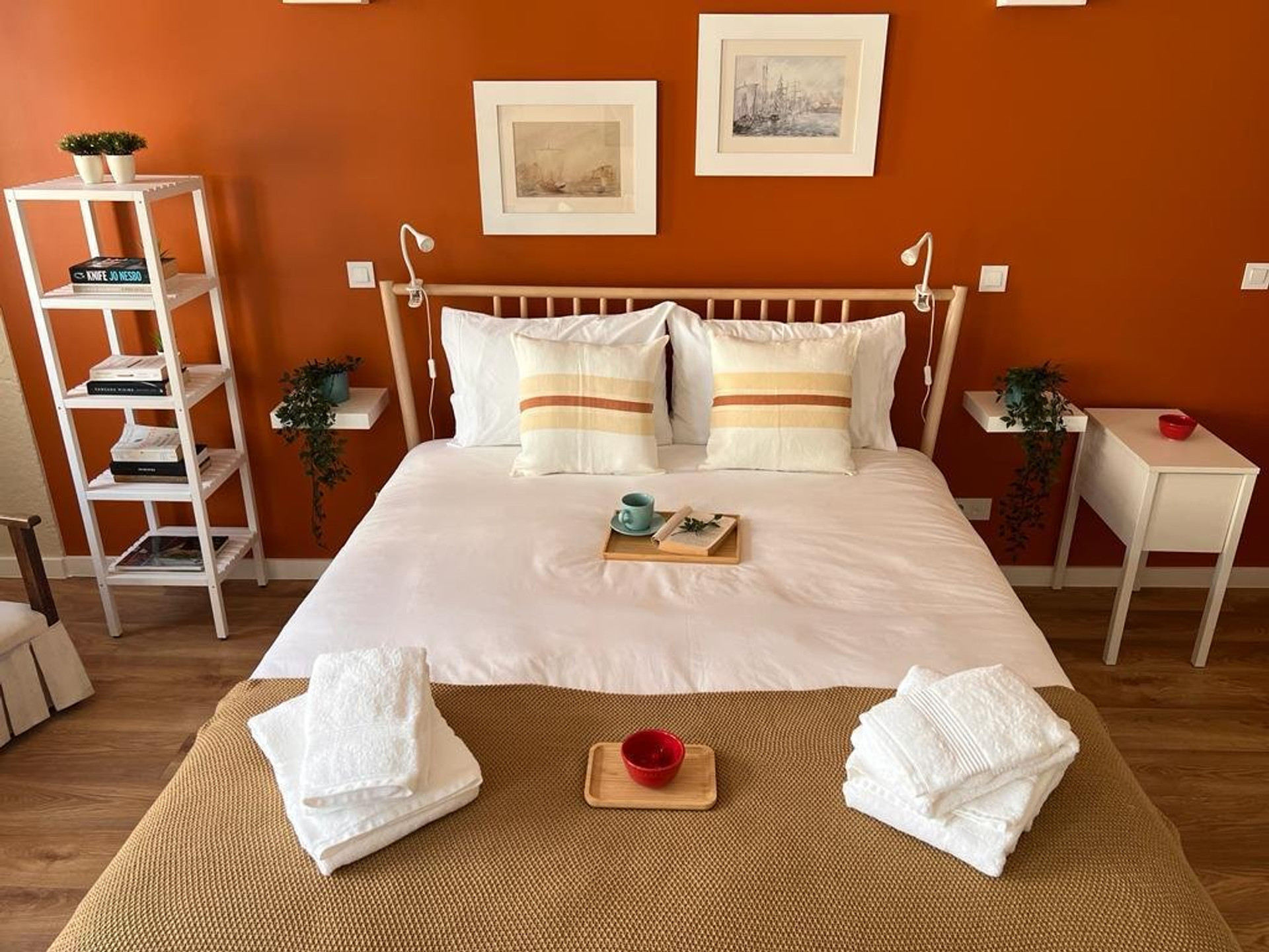 Cozy bedroom with orange accent wall