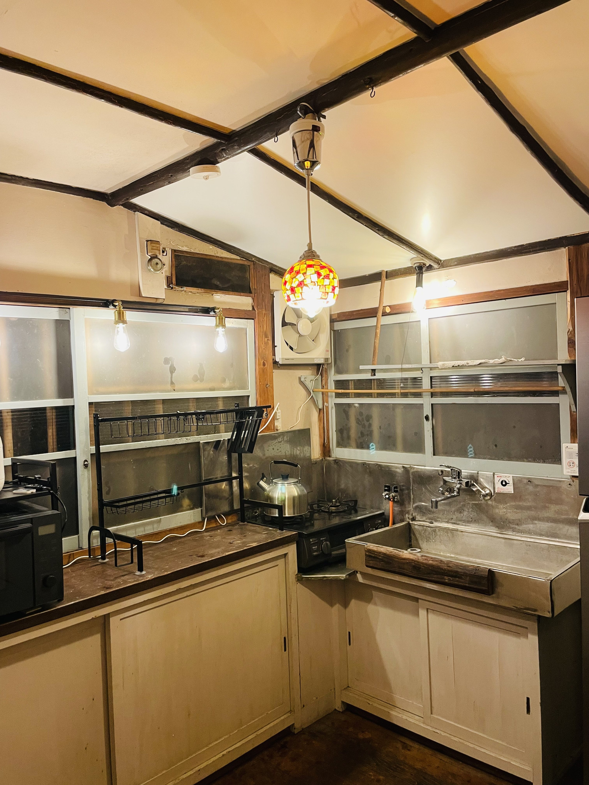 Kitchen with stove and sink