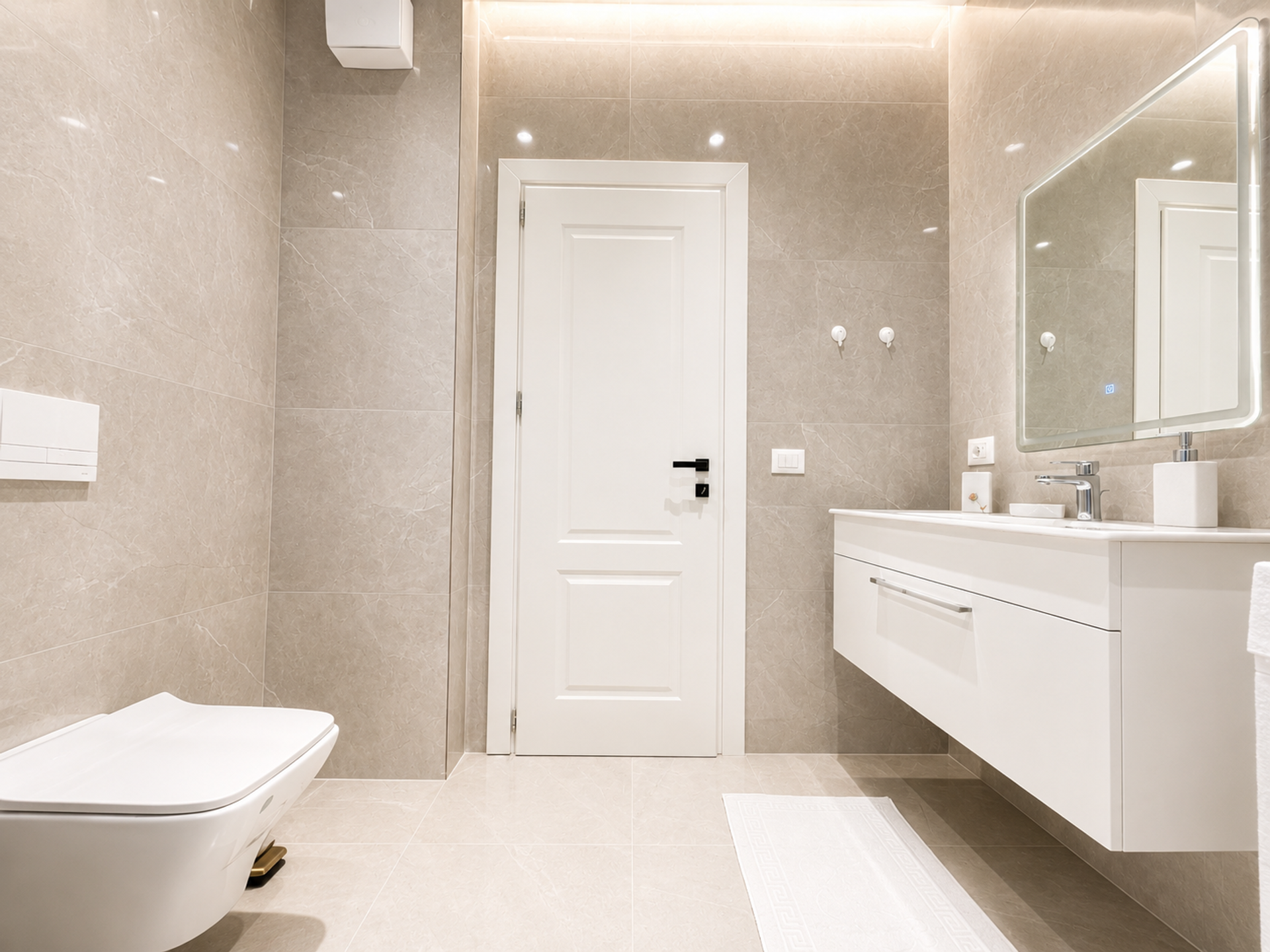 Spacious bathroom vanity and toilet