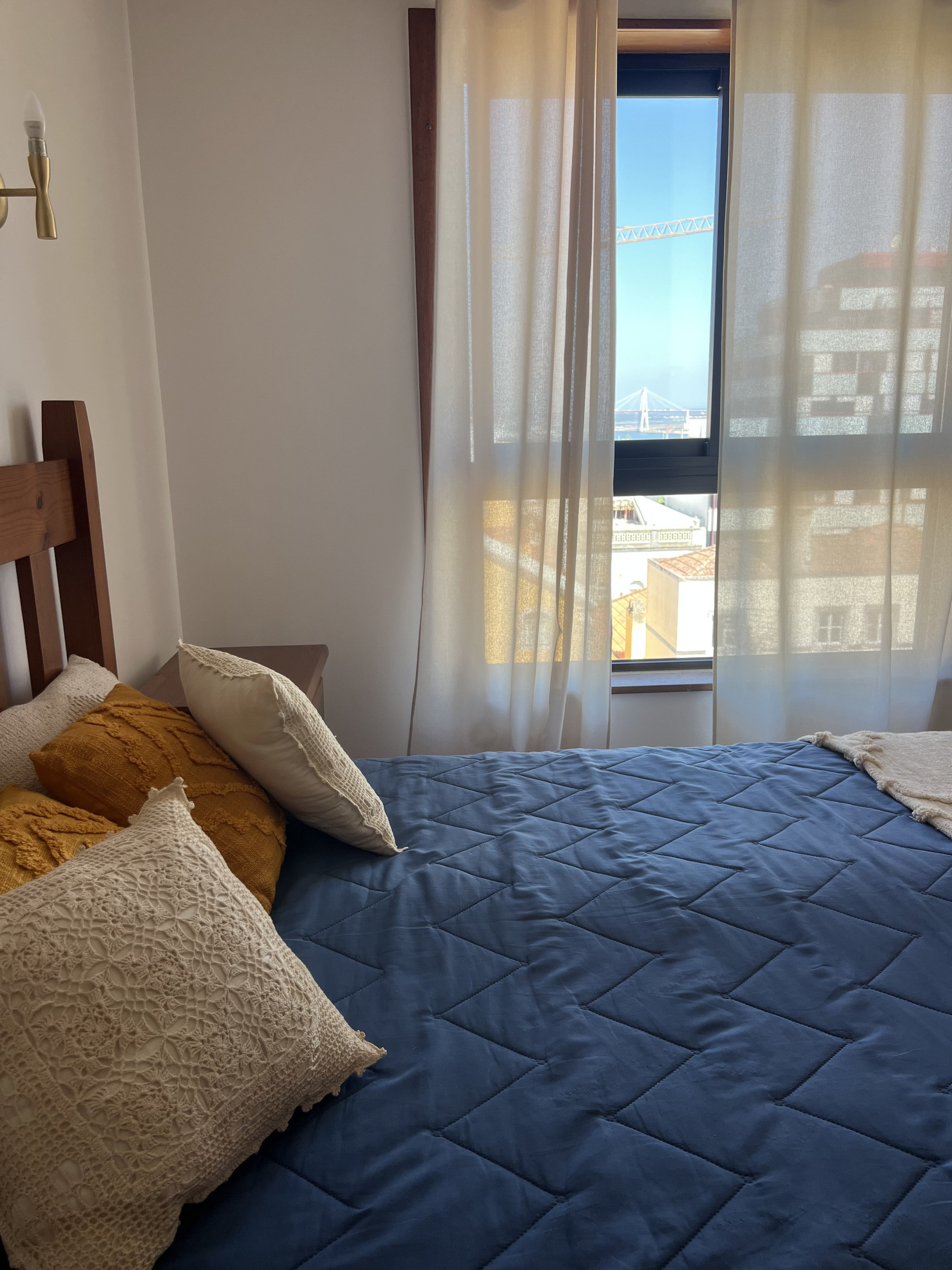 Bedroom with blue bedding