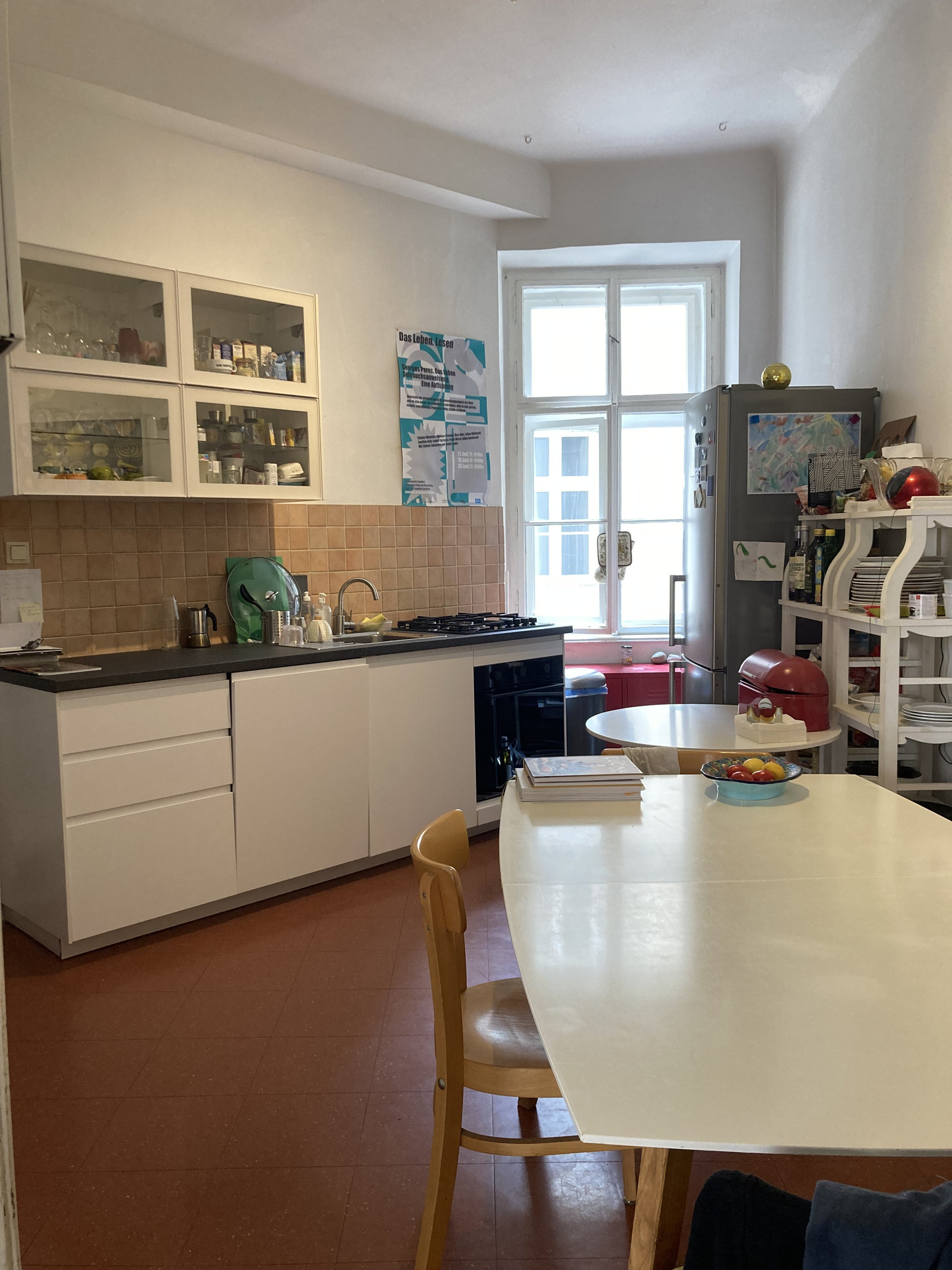 Kitchen with cabinets and window