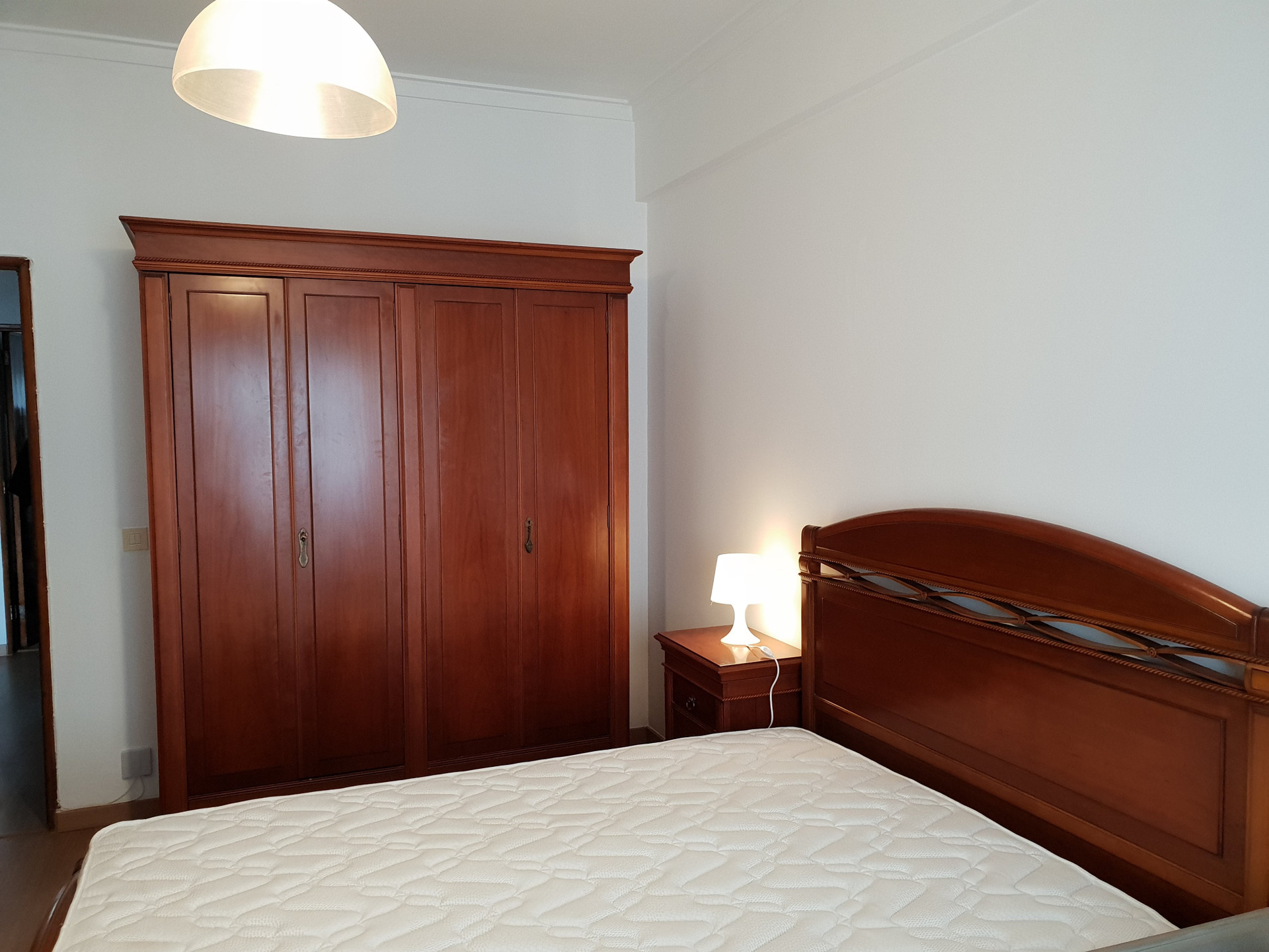 Bedroom with large wardrobe