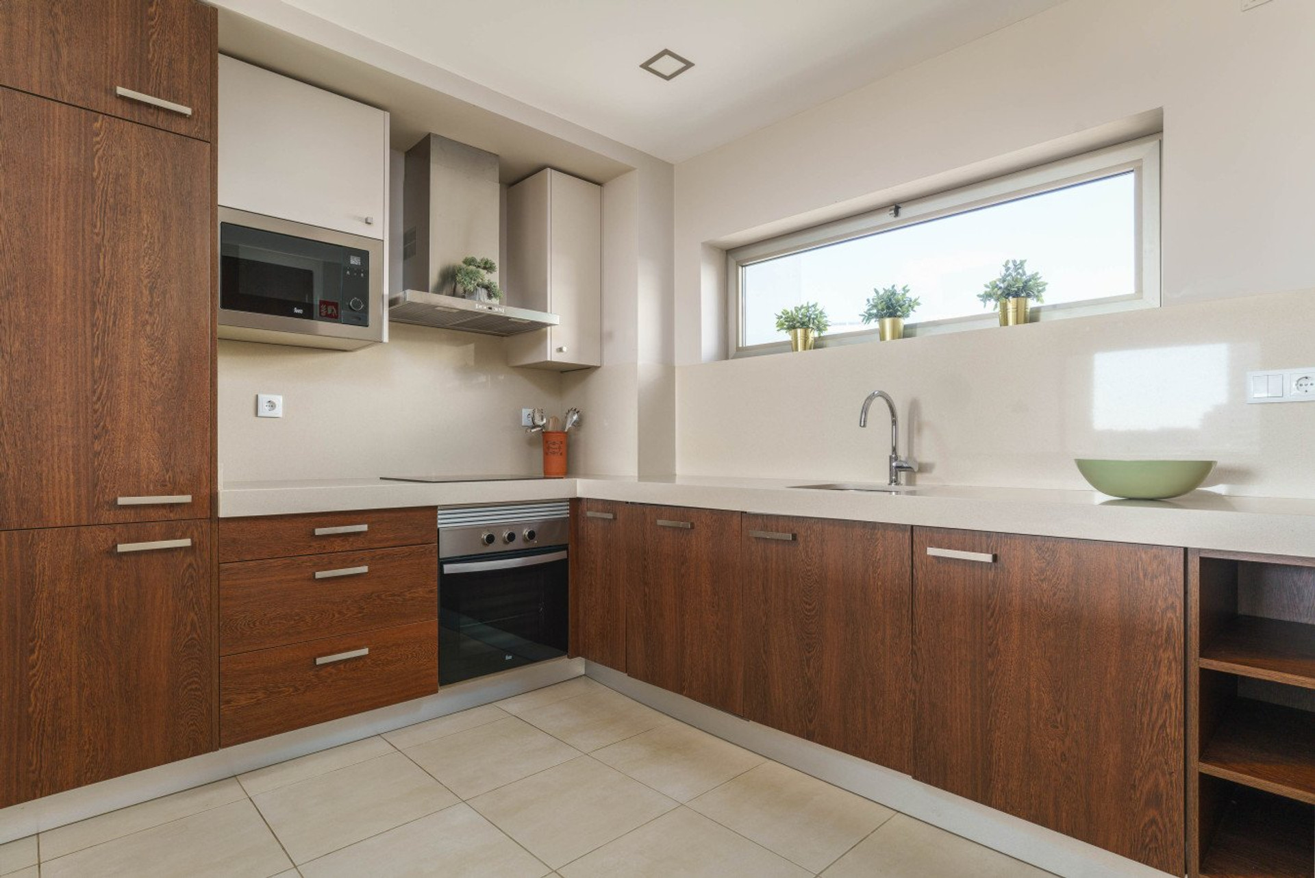 Modern kitchen with wood cabinets