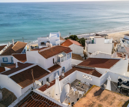 Comfy Flat W/ Rooftop Beach View by LovelyStay