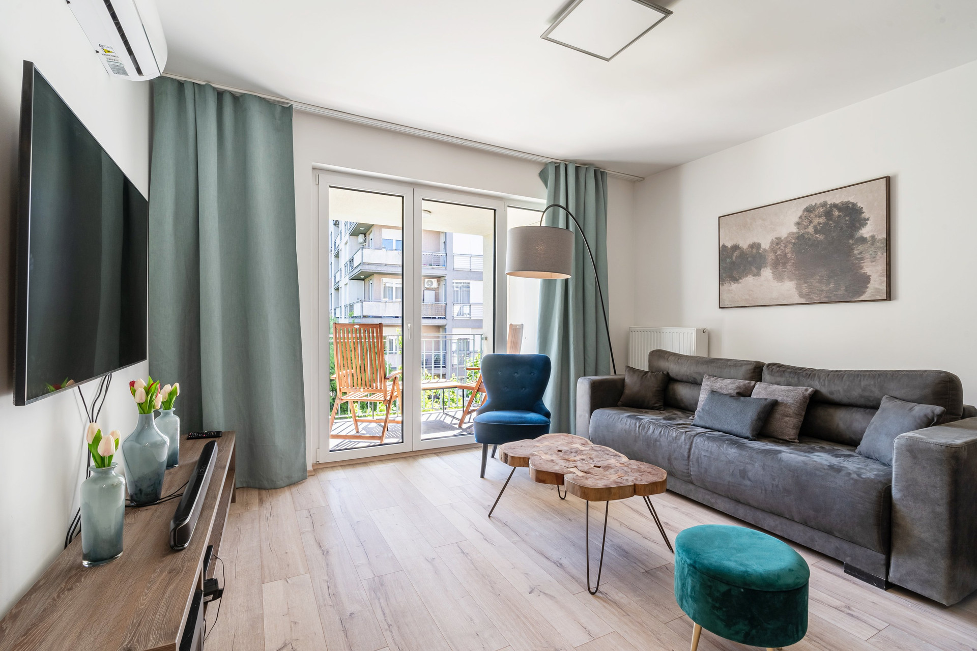 Bright living room with balcony access