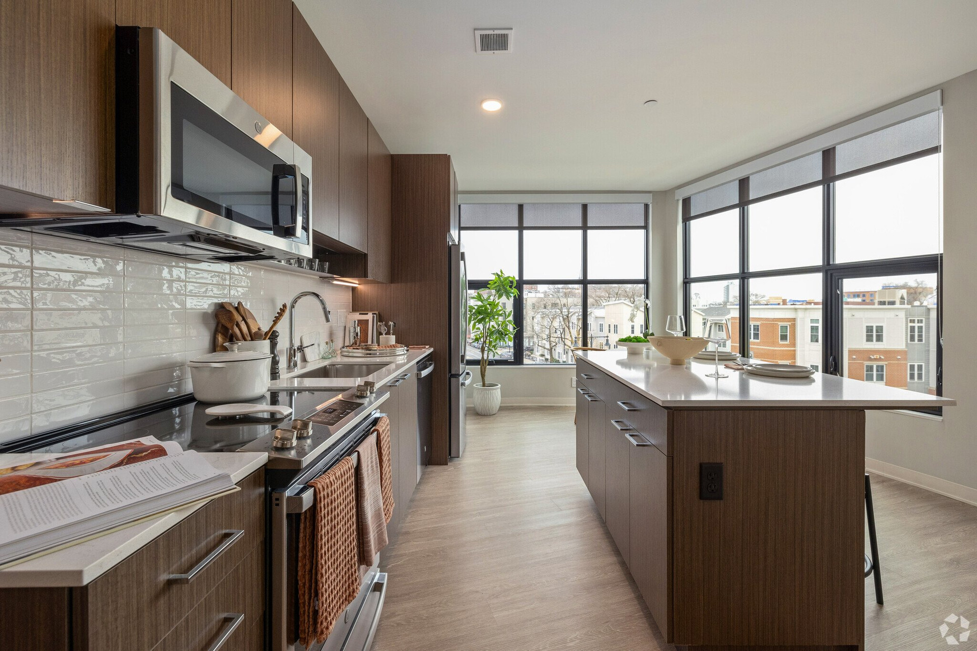 Kitchen with island and corner windows