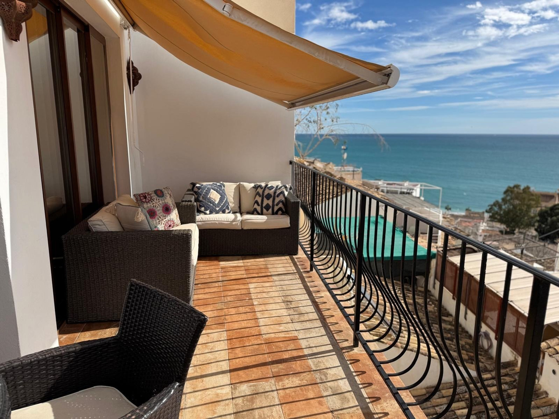 Balcony with sea view and sofa
