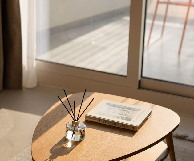 Coffee table near balcony door