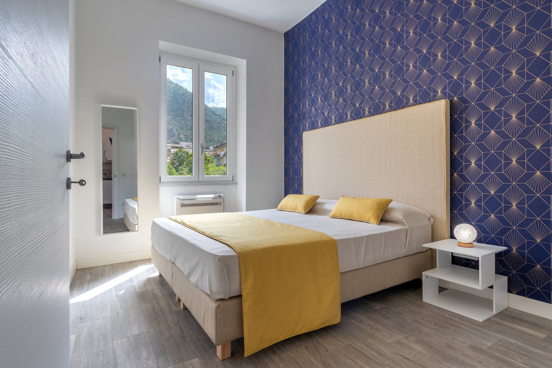 Bedroom with window mountain view