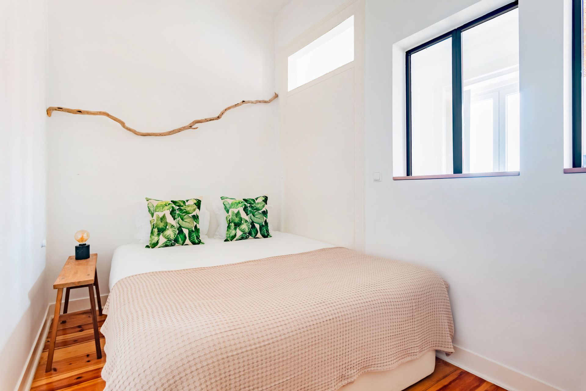 Interior bedroom (no windows to the outside) with a double bed.