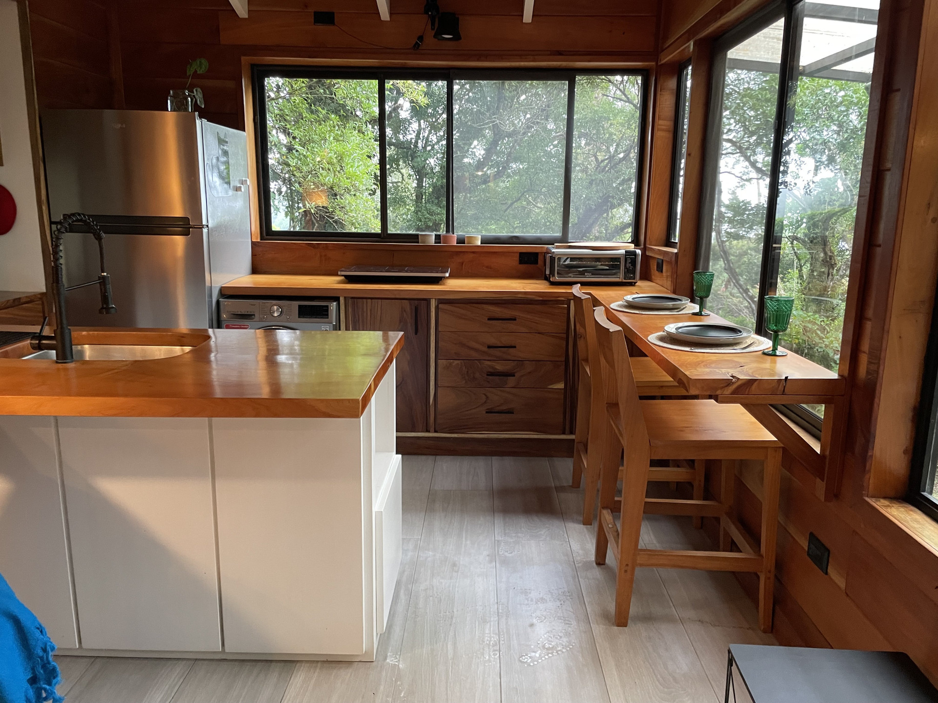 Kitchen with island and window bar