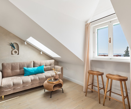 Sunny attic with sea view