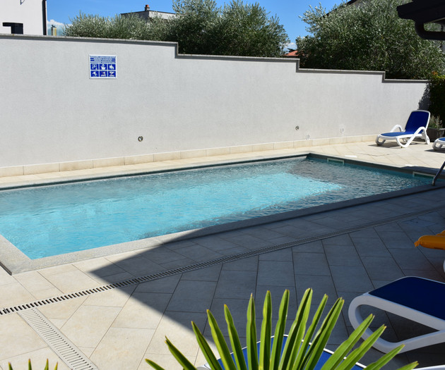 Pool with poolside loungers